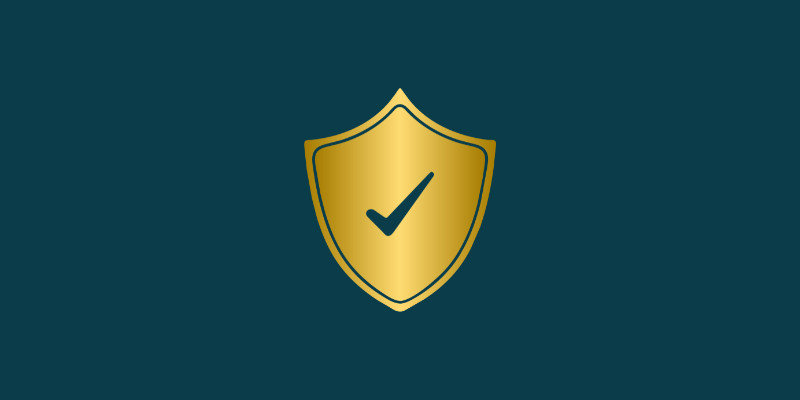 A gold shield icon with a dark teal checkmark inside, centered on a dark teal background.